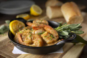 Large shrimp sautéed in a pan sauce of garlic, butter, Worcestershire, lemon, and herbs. Served with authentic Leidenheimer bread for dipping.